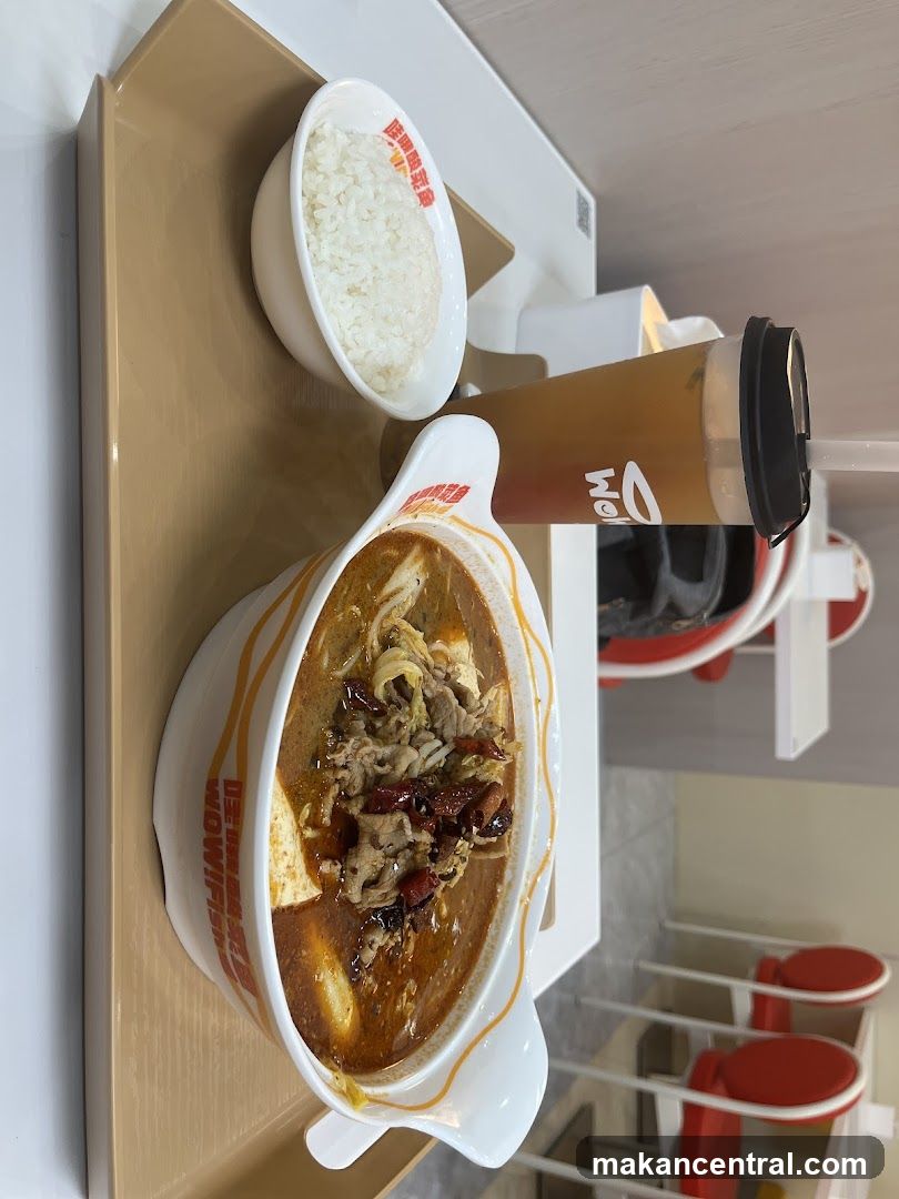 Spicy Noodle Soup with Rice and Drink
