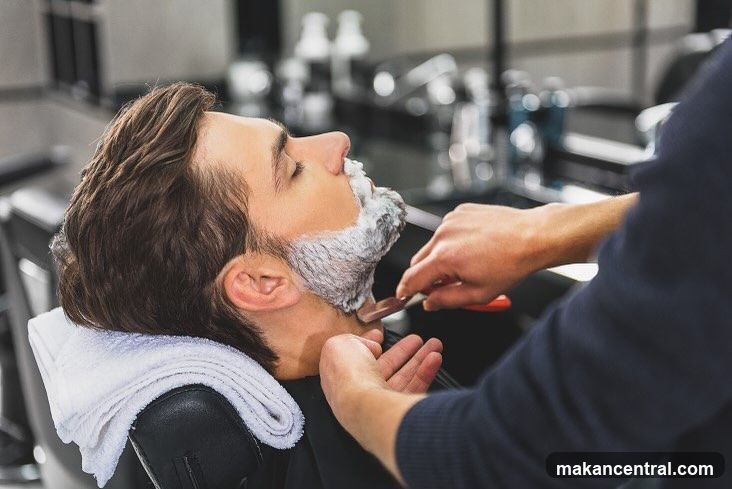 Barber Shaving a Client