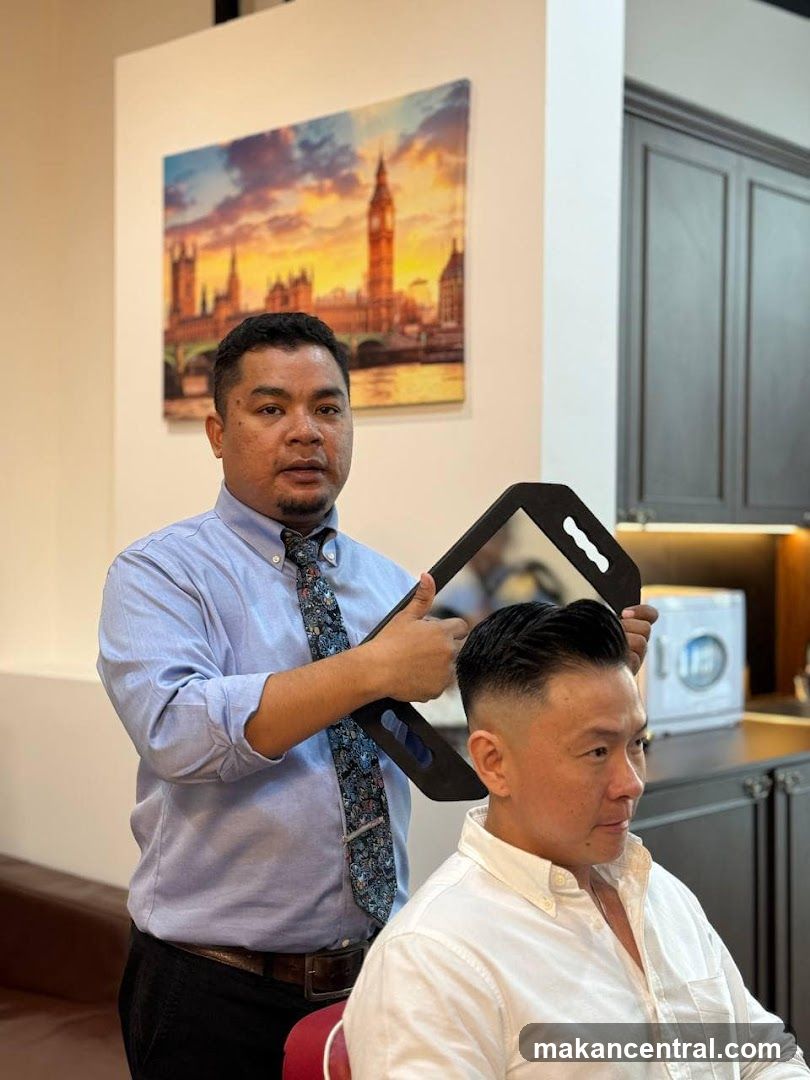 Barber showing a client his haircut