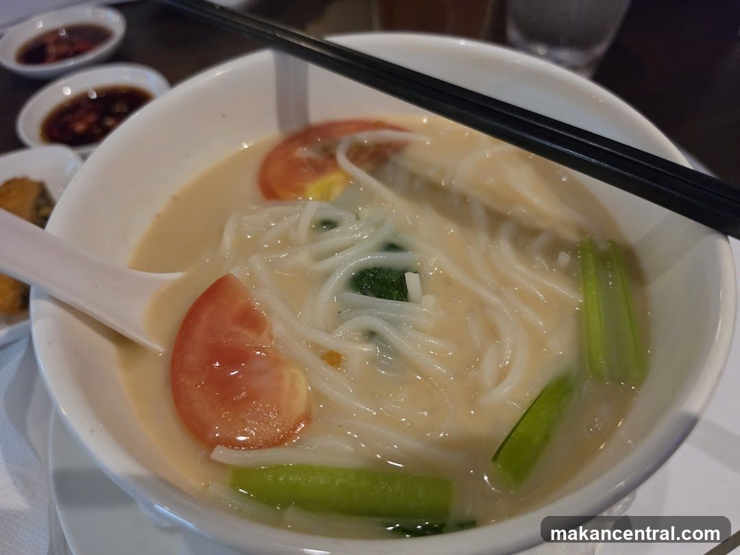 Noodle Soup with Tomatoes and Greens