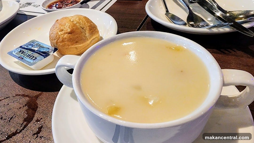 Creamy Soup with Bread Roll