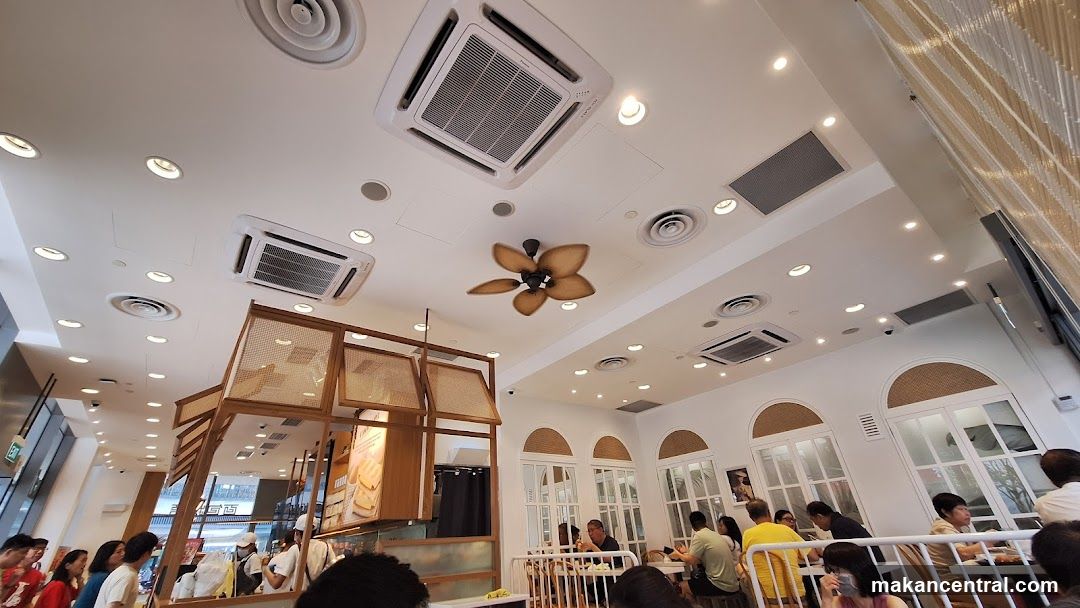 Interior of a cafe with customers