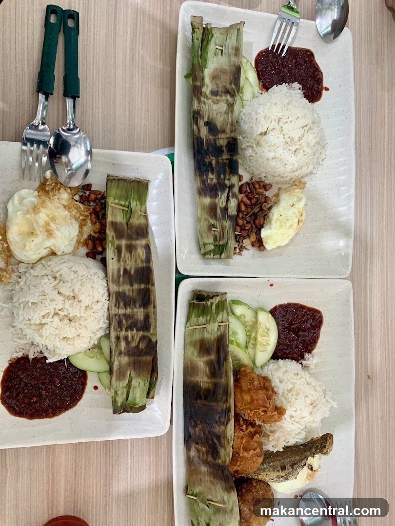 Three plates of nasi lemak