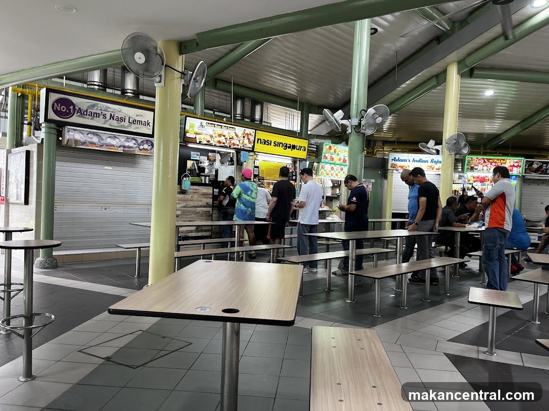 Food court with various stalls and seating