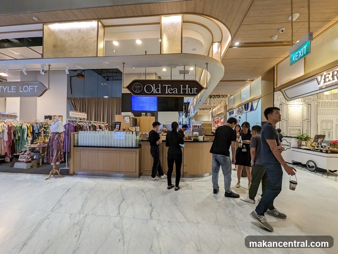 Interior of a shopping mall with various shops
