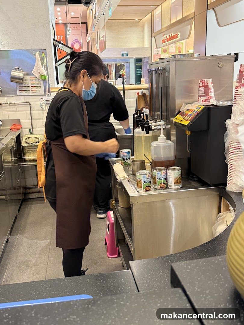 Staff preparing drinks