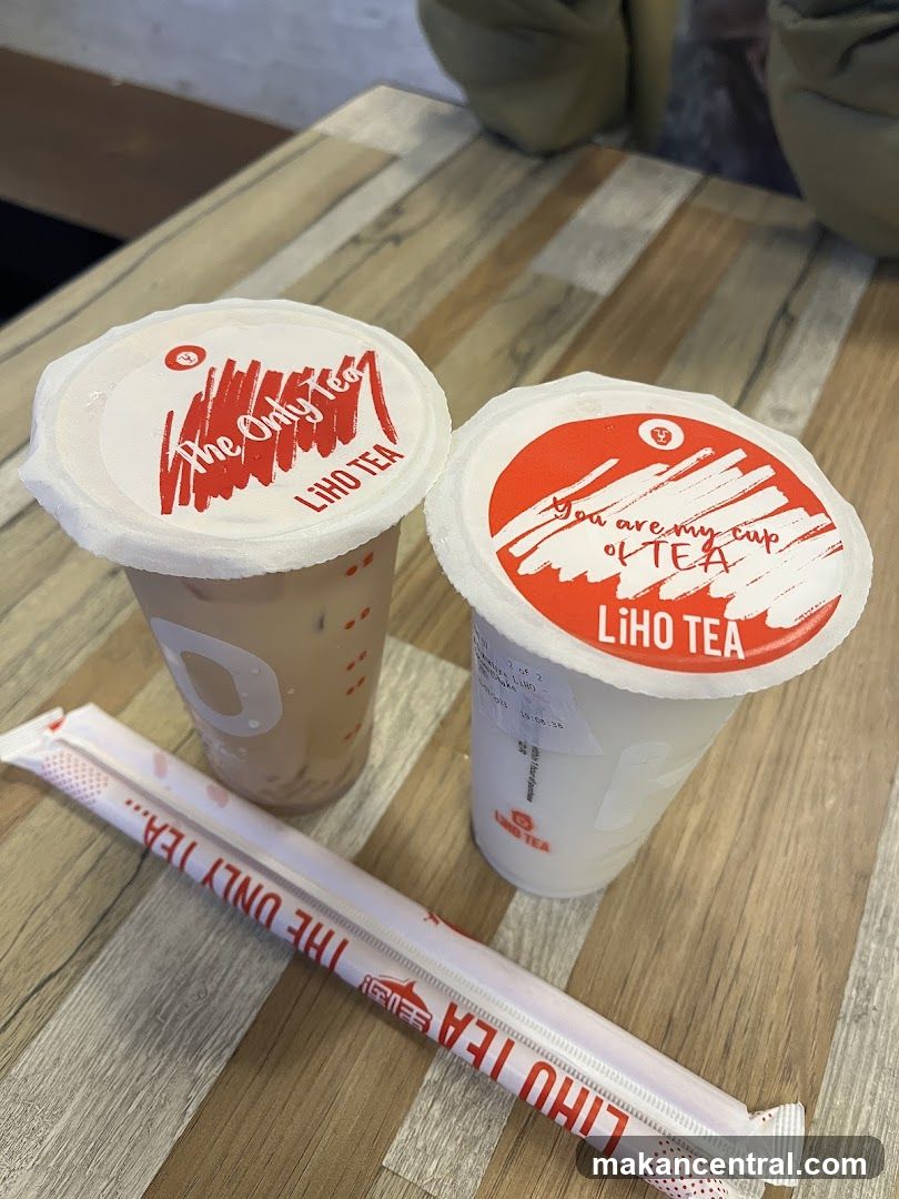 Two LiHo Tea drinks and straws