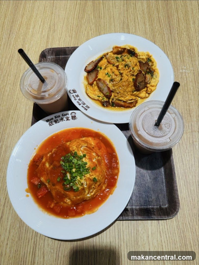 Two dishes and drinks on a tray