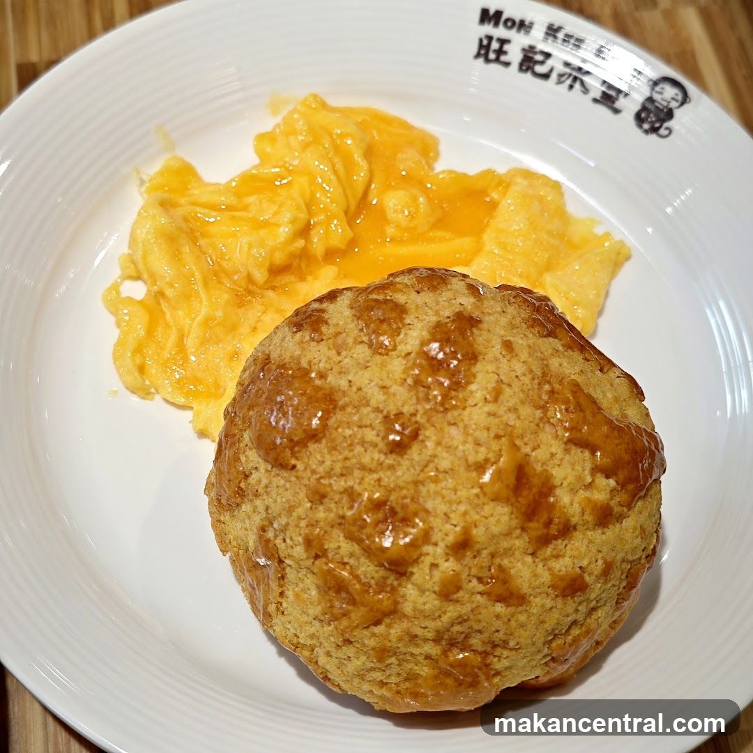 Scrambled Eggs and Baked Bun