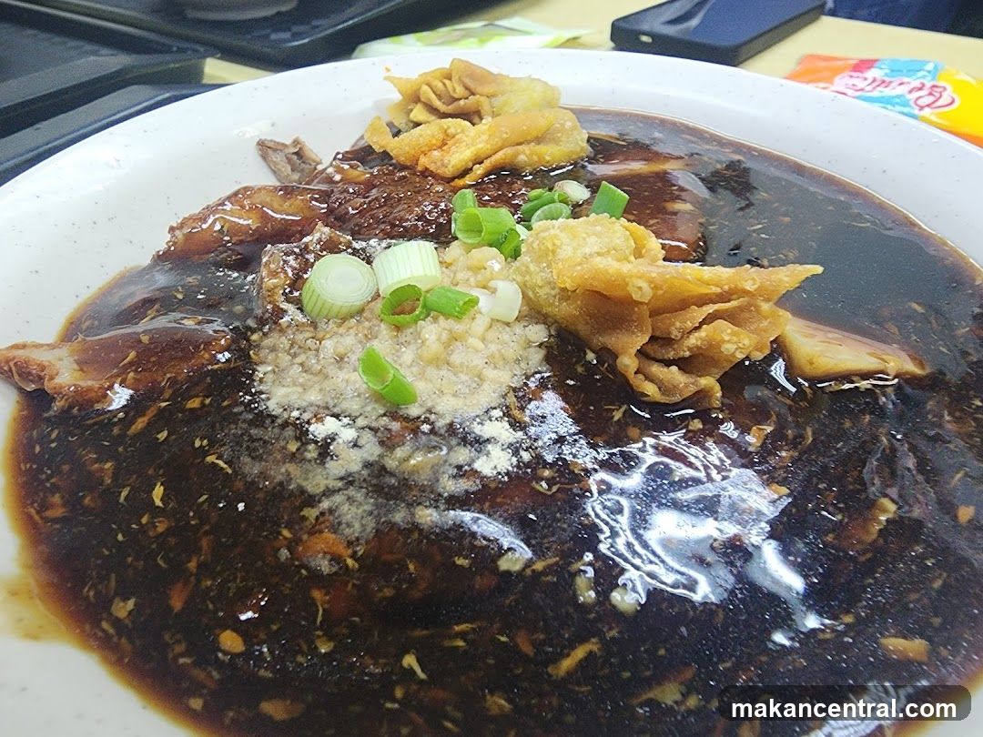 Noodles with Dark Sauce and Toppings