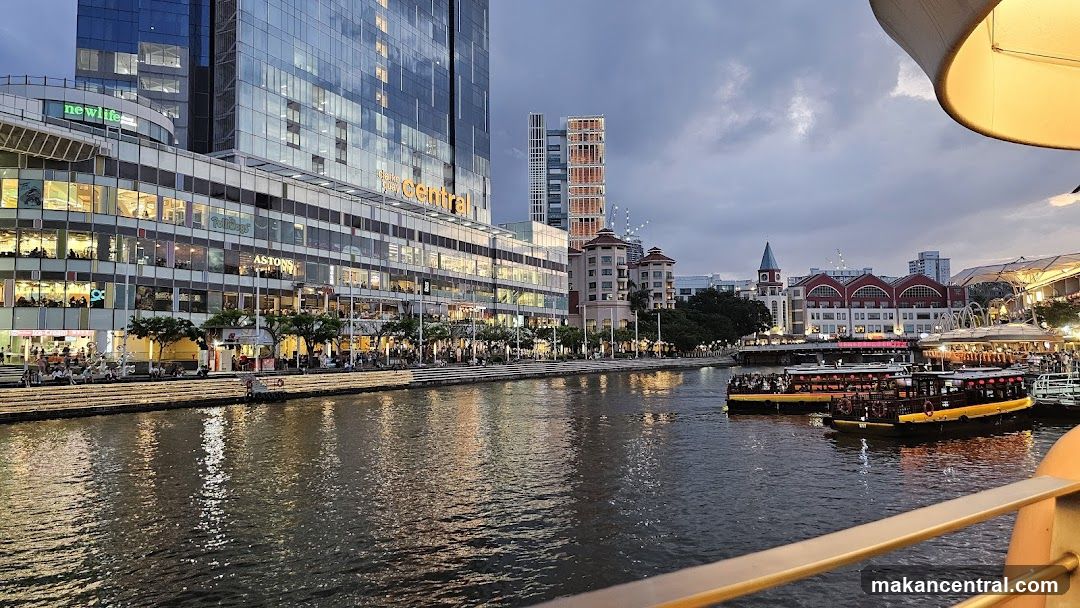 Riverfront cityscape at dusk