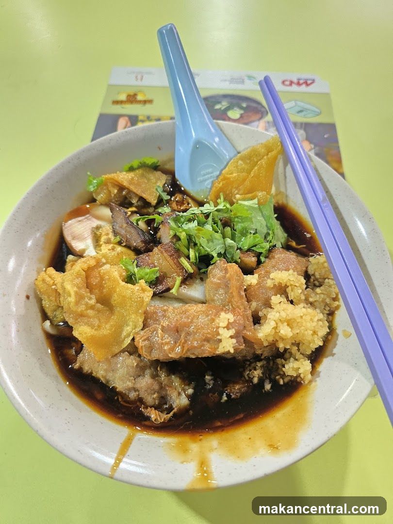 Noodle Dish with Spoon and Chopsticks