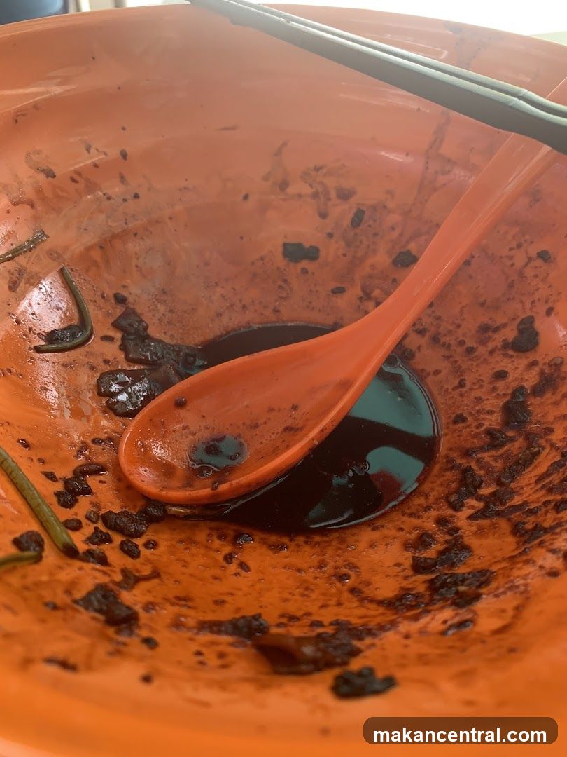 Dirty Bowl with Spoon and Chopsticks