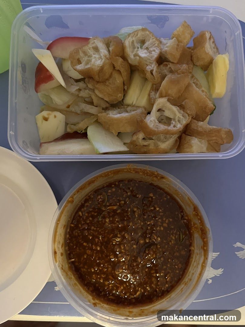 Fruit Salad with Fried Dough and Peanut Sauce
