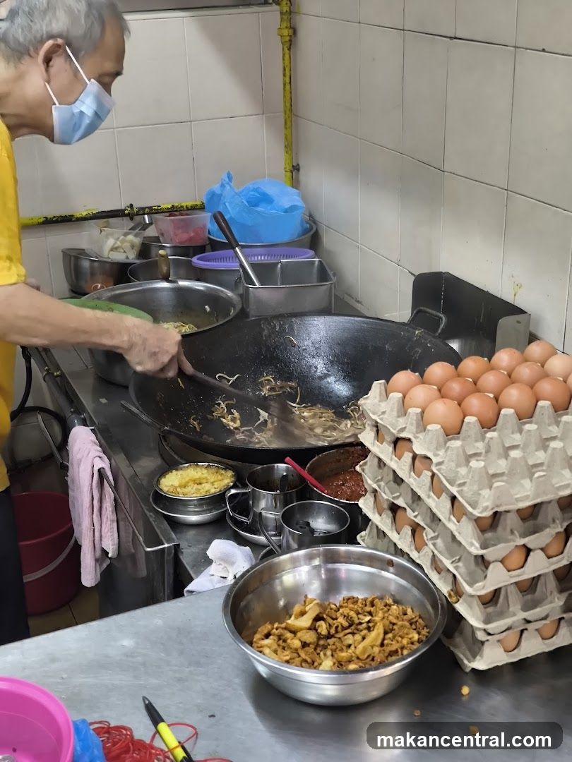 Cook preparing food in a kitchen