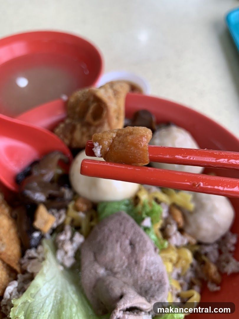 Close-up of a bowl of noodles with various toppings