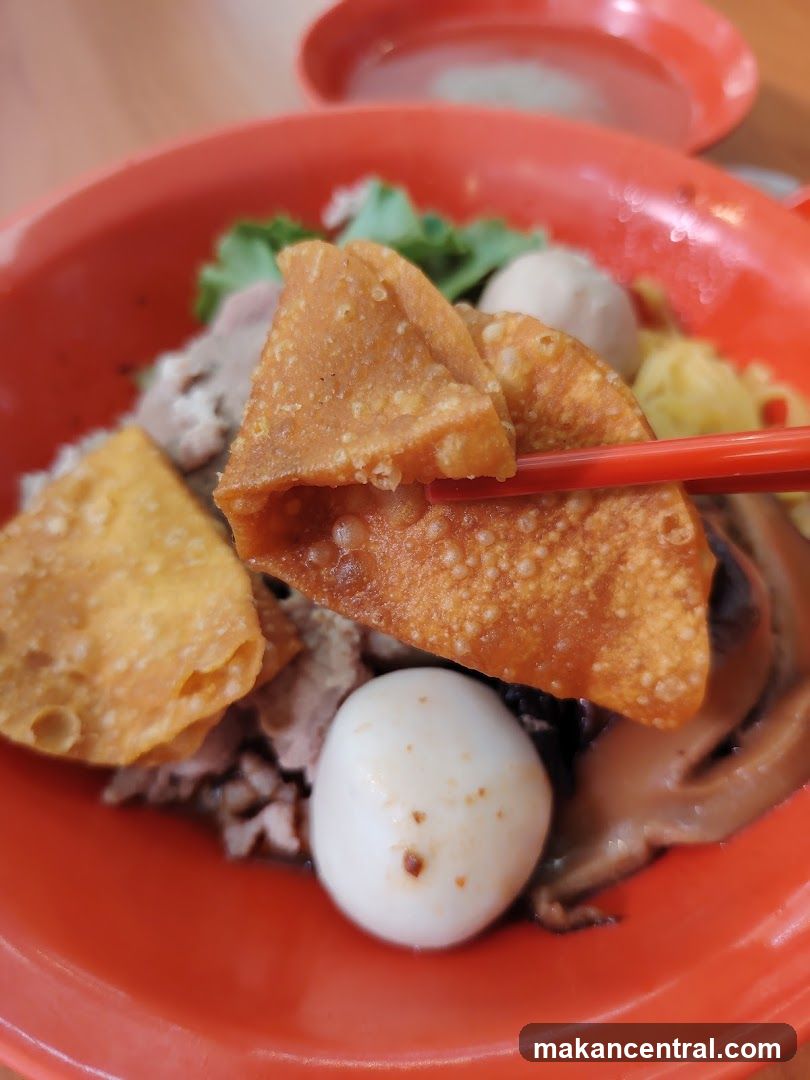 Noodle Dish with Fried Wontons