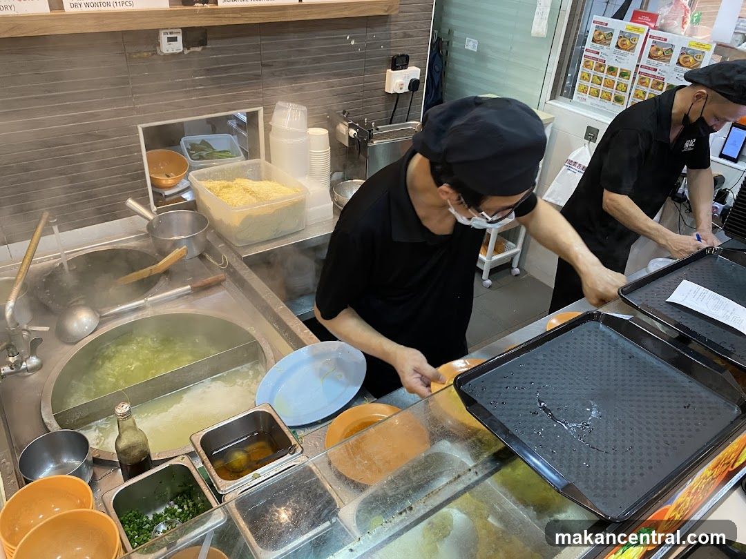 Kitchen Staff Preparing Food