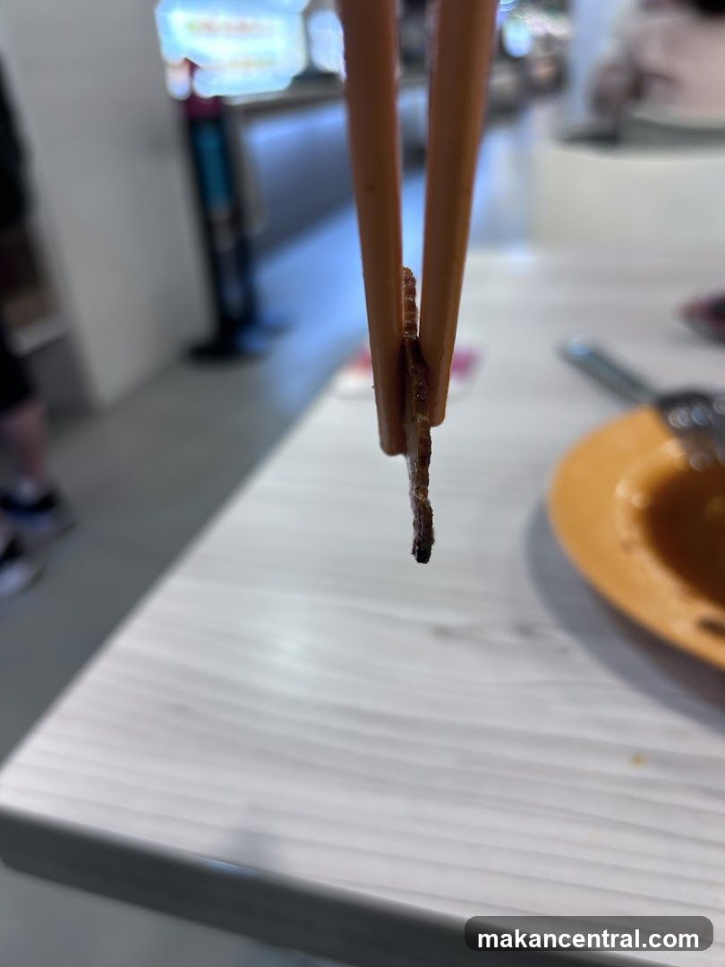 Chopsticks Holding Food