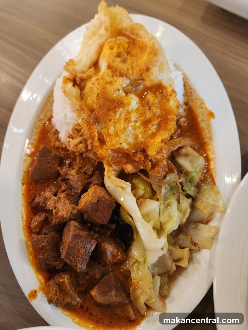 Curry Rice with Fried Egg and Cabbage