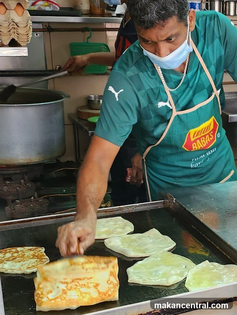Man cooking flatbread