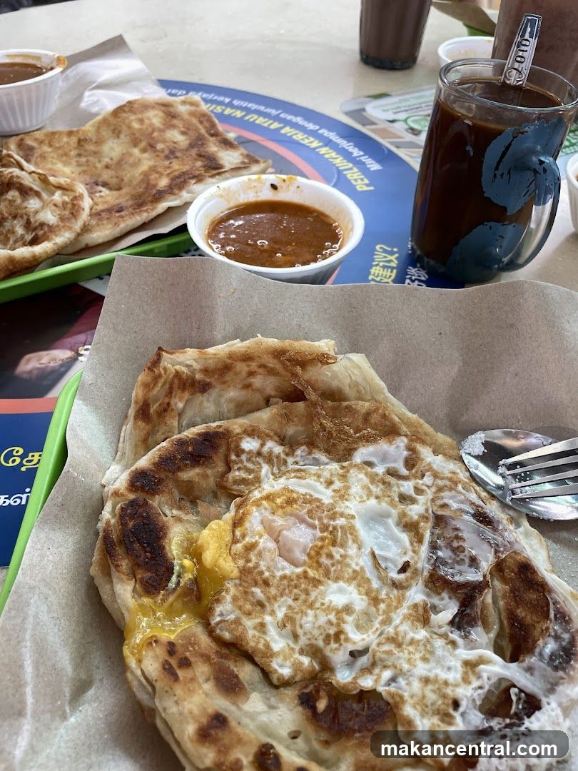 Roti Canai with Egg and Curry