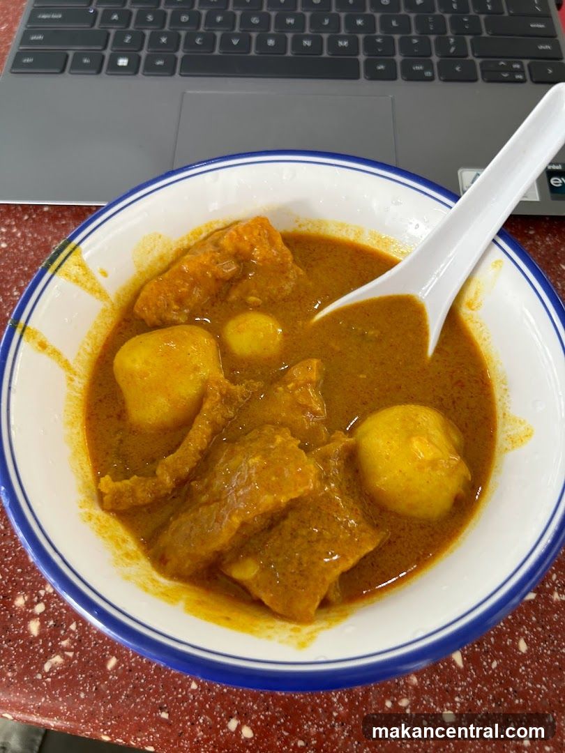Curry with Potatoes and Fish Cake