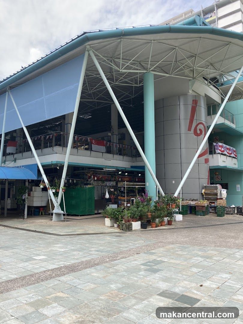 Market stalls with produce and plants