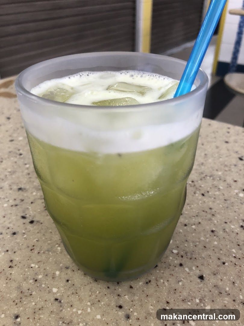 Green Drink with Foam and Ice