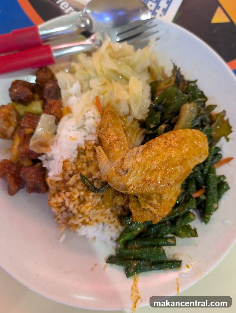 Plate of food with rice and various dishes