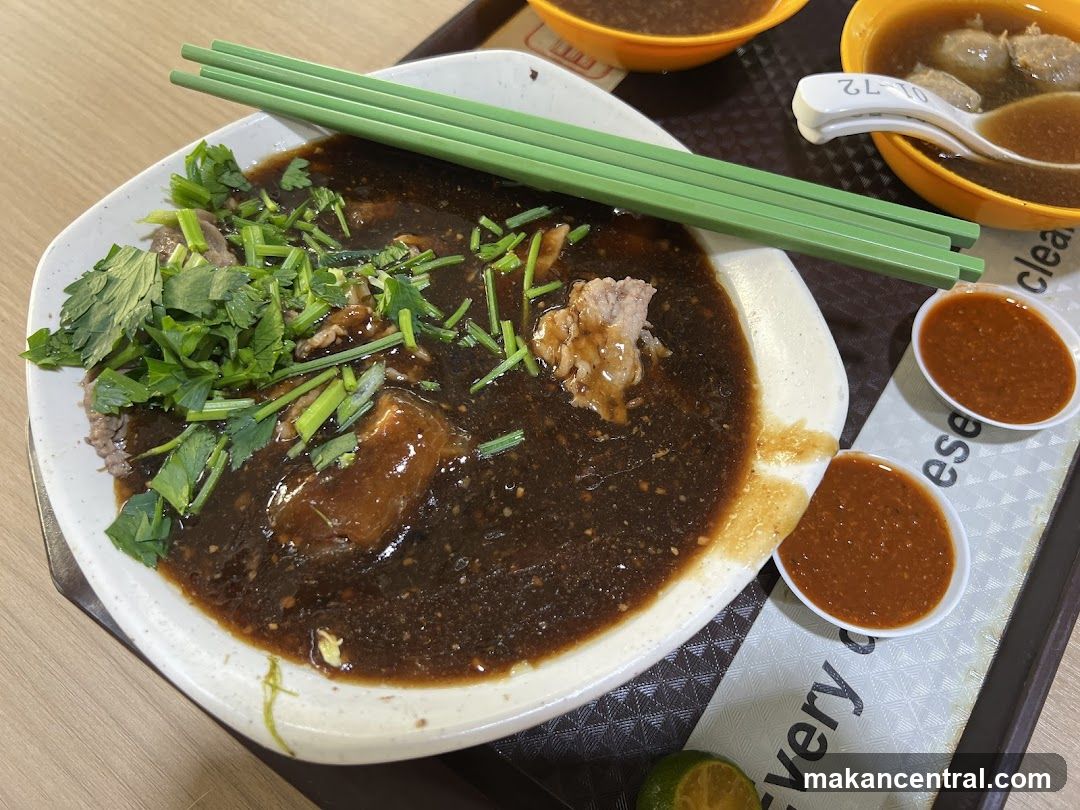 Beef noodle soup with chili sauce