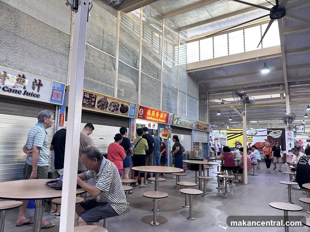 Hawker Centre with Food Stalls and Diners
