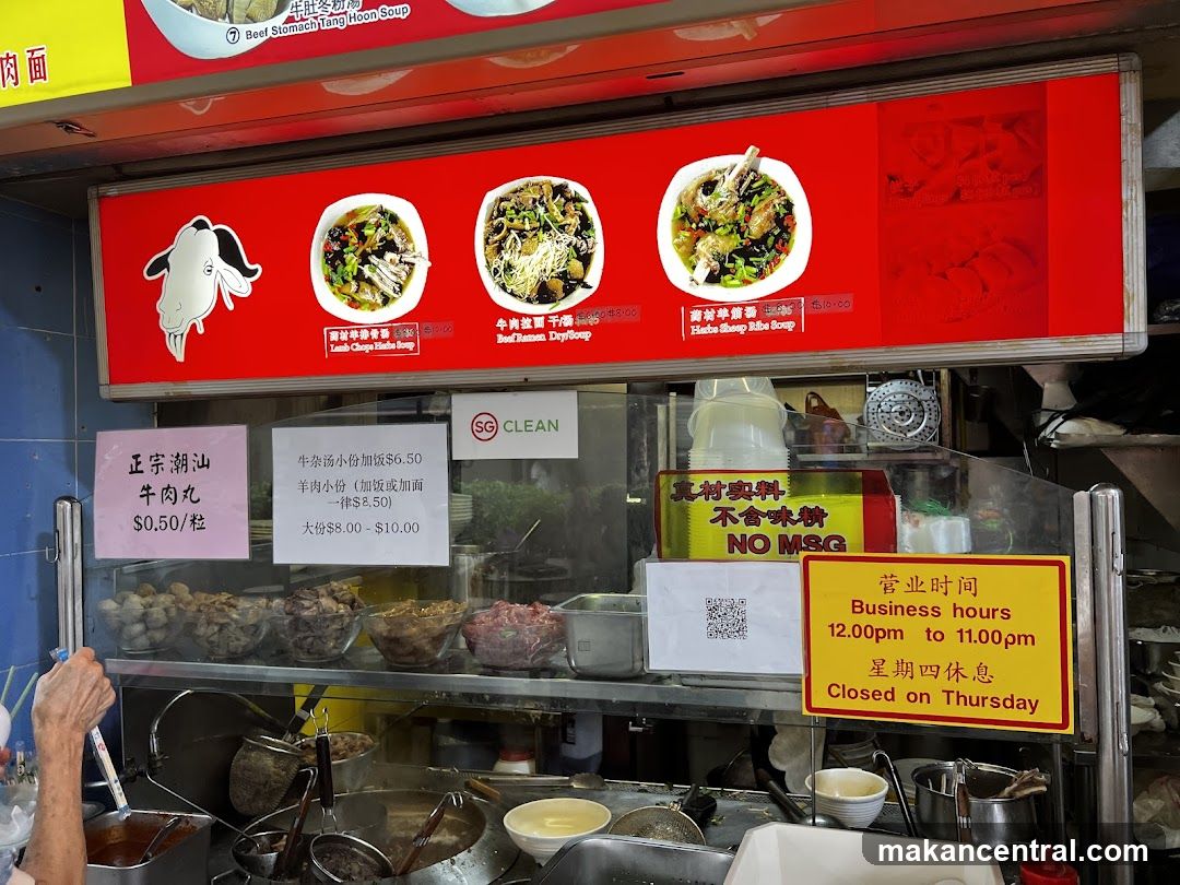 Food stall with menu and business hours