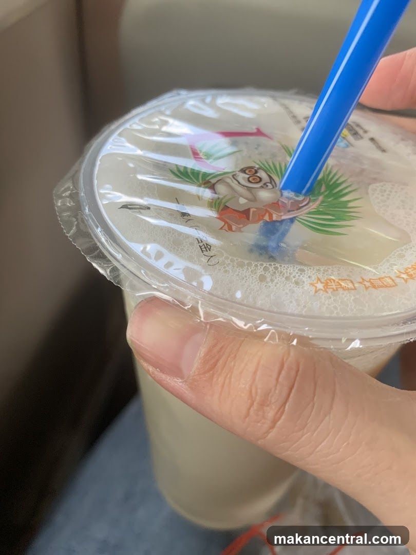 Beverage with cartoon character on lid