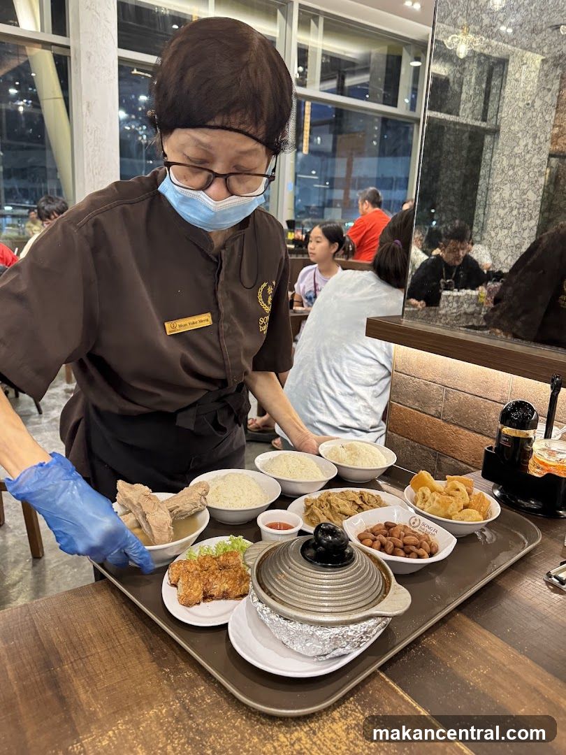 Server presenting a tray of food