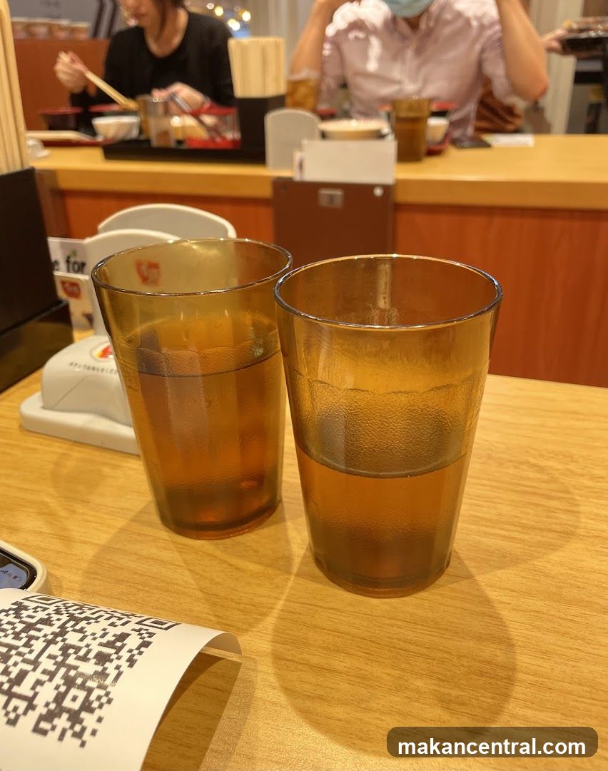 Two glasses of iced tea on a table