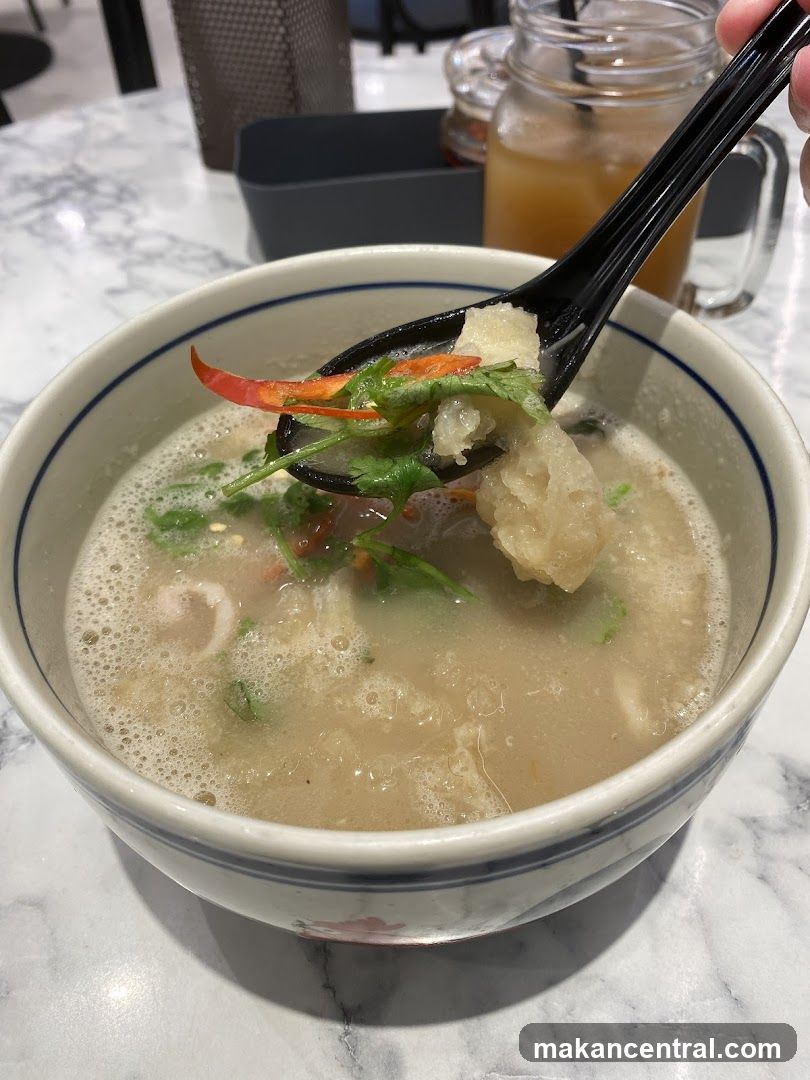 Bowl of Soup with Spoon