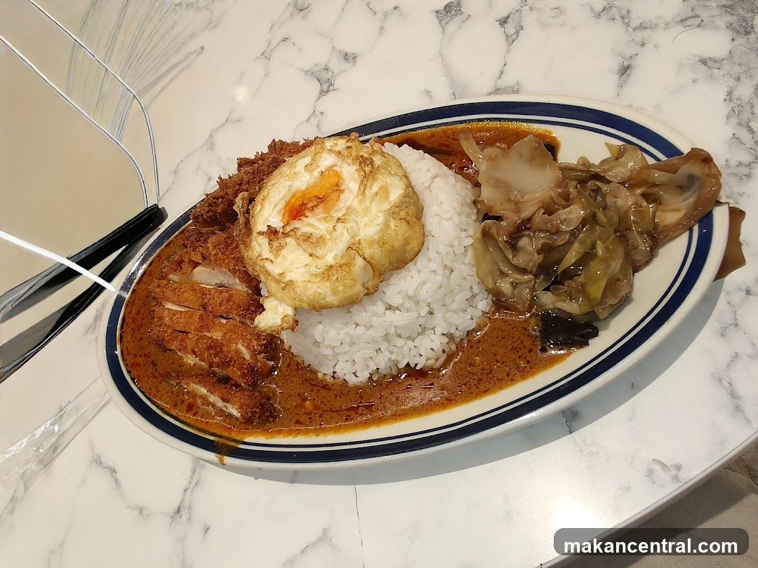 Curry Rice with Fried Egg and Pork Cutlet