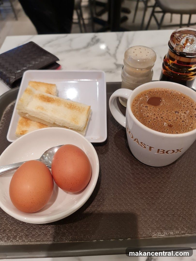 Breakfast Tray with Toast, Eggs, and Coffee