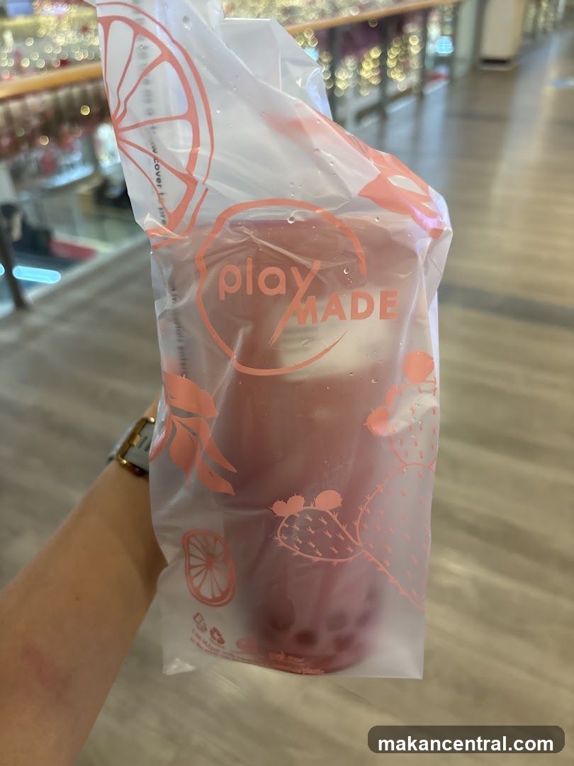 Drink in a branded bag