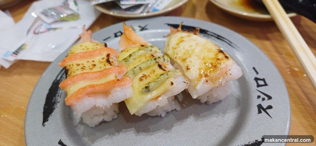 Three pieces of sushi on a plate