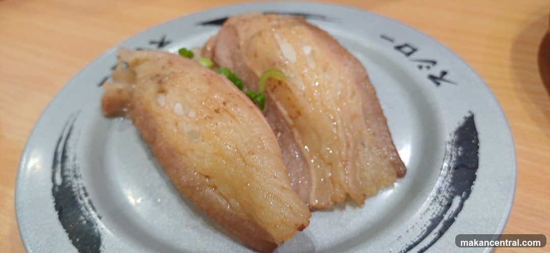 Two pieces of sushi on a plate