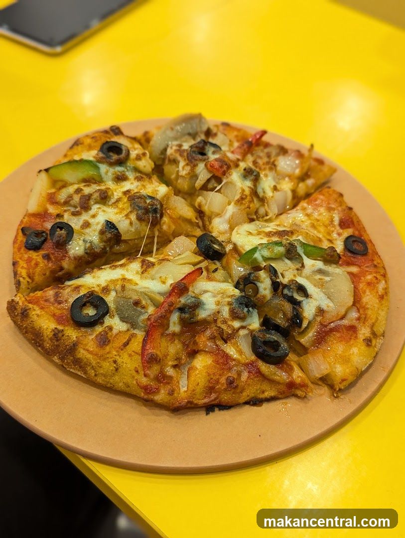 Pizza on a yellow table