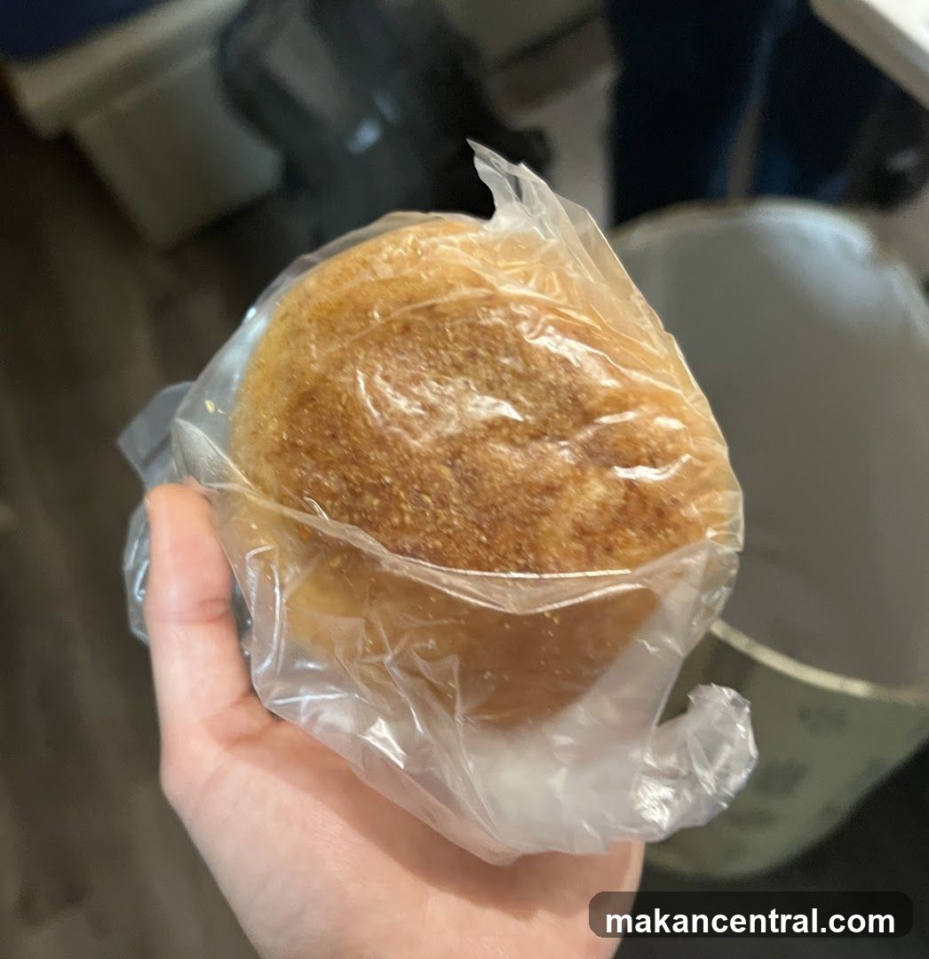 Bread roll in plastic packaging