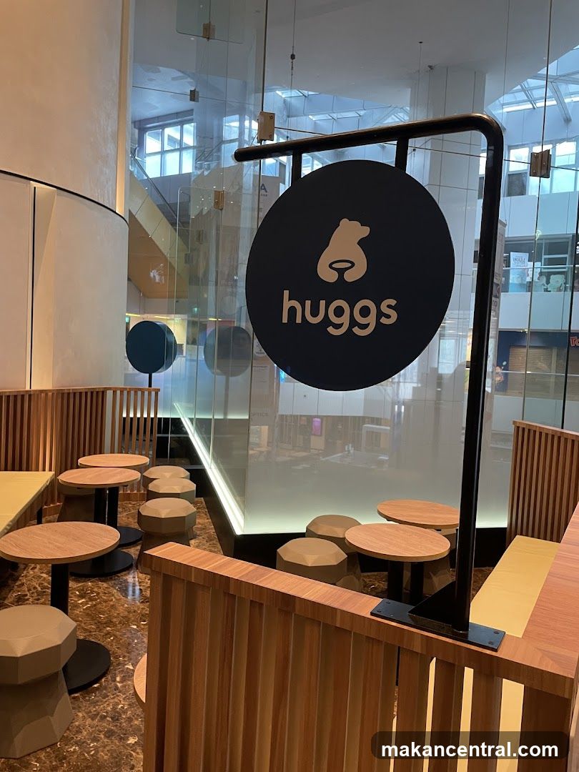 Cafe Interior with Huggs Signage