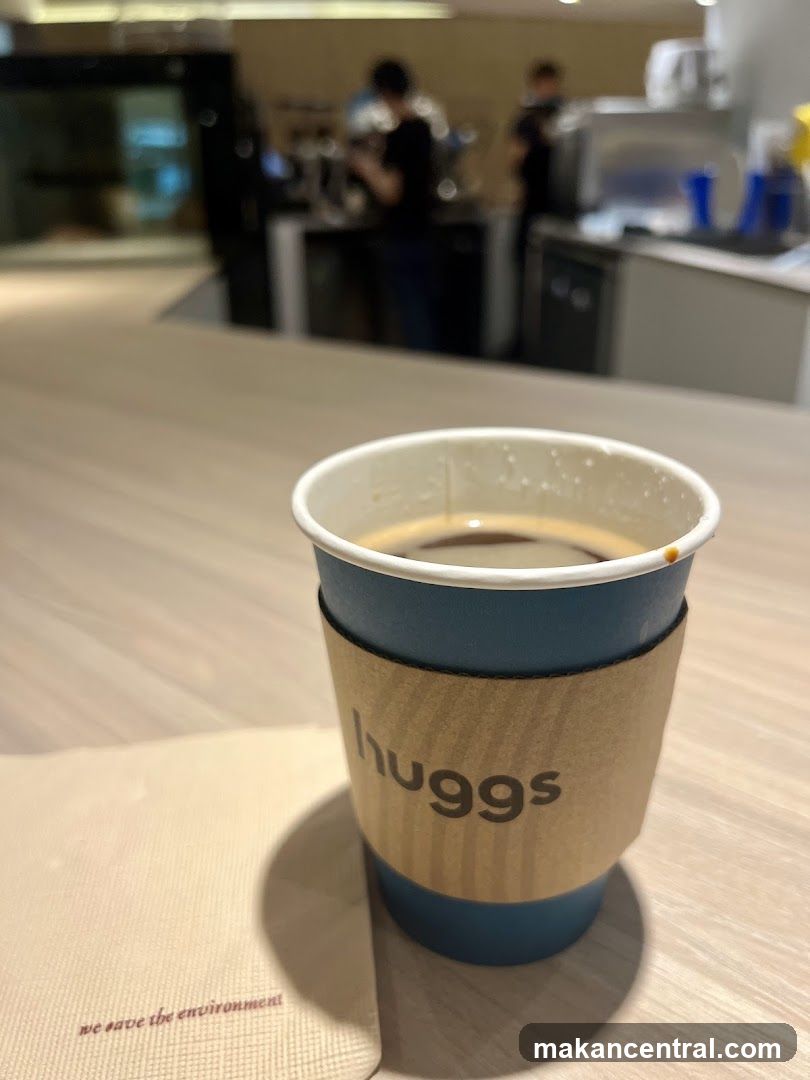 Coffee Cup with Huggs Logo