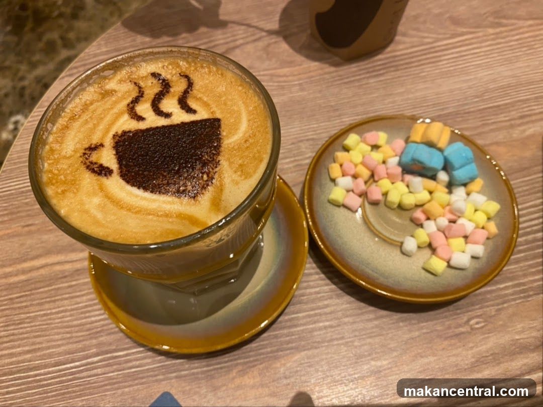 Coffee with latte art and marshmallows