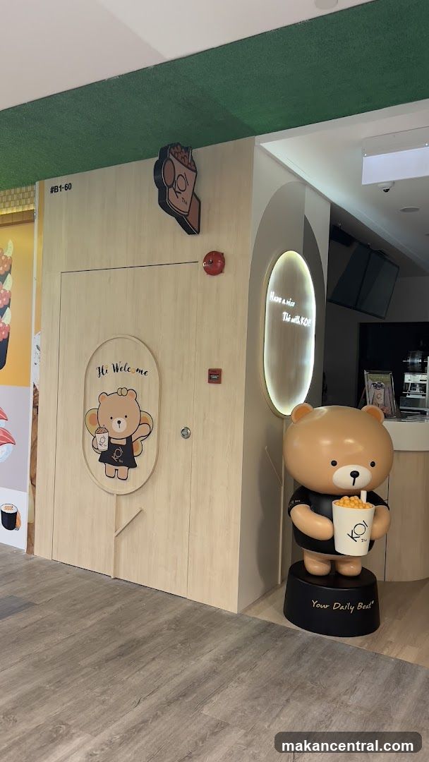 Bear mascot outside a shop