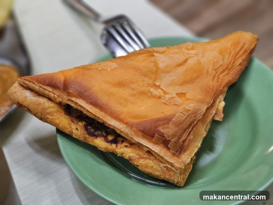 Triangular Pastry on a Plate