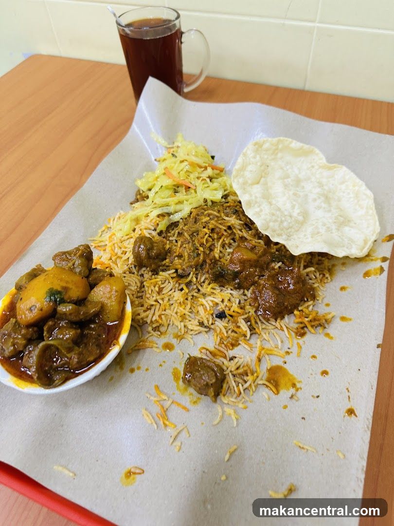 Biryani with Side Dish and Tea
